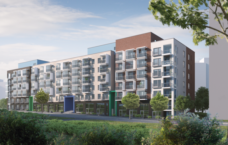 Uusi valkoinen kerrostalo.
