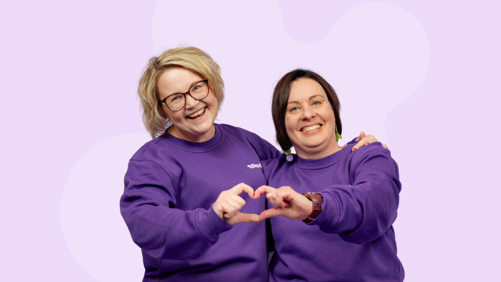 Two smiling Tavana employees.